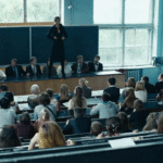 super-hot-woman-unwrapping-in-front-of-students