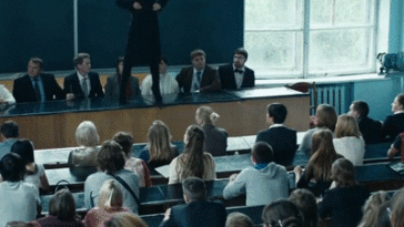 super-hot-woman-unwrapping-in-front-of-students