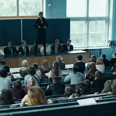 super-hot-woman-unwrapping-in-front-of-students