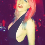 honey-with-rosy-hair-demonstrating-one-of-her-pierced-nips