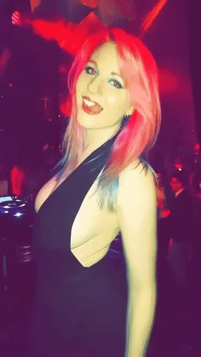 honey-with-rosy-hair-demonstrating-one-of-her-pierced-nips