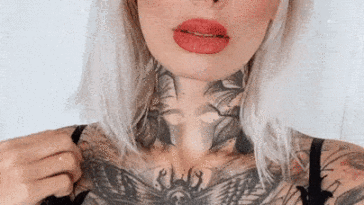 dominatrix,cougar,tattoos,bdsm,giant-breasts