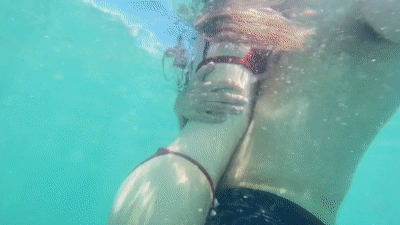[Image: 121928-underwater-make-out.gif]